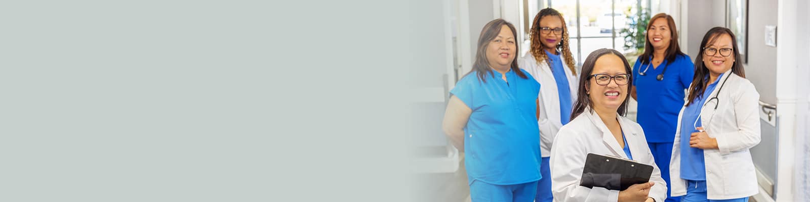 several nurses in the hallway of Canyon Springs Post-Acute